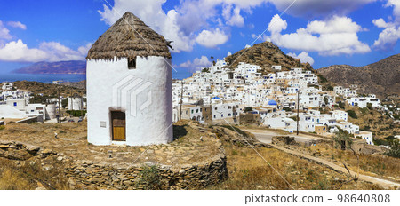 Greece travel, Cyclades. Scenic Ios island, view of picturesque Chora village and old windmills 98640808