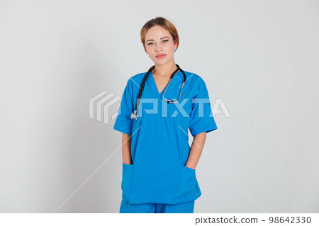 a doctor in a blue suit with a phonendoscope stands on a white background 98642330