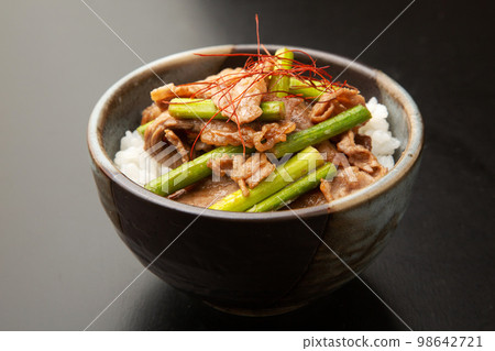 Beef bowl with garlic sprouts 98642721