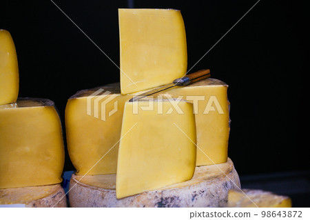 Delicious gourmet cuts of kashkaval or kasseri cheese for sale Delicious gourmet cuts of kashkaval or kasseri cheese for sale 98643872