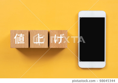 Block and smartphone written as price increase 98645344