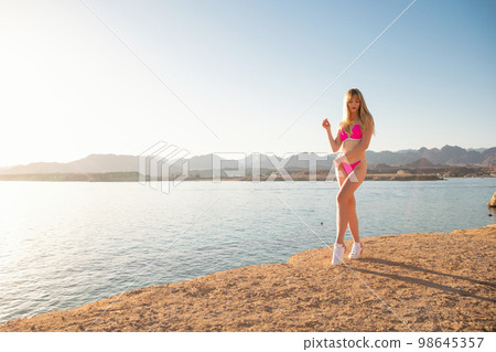 Young woman wearing a swimsuit 98645357