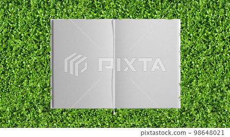 A green garden with vivid greens and a background of a white book with a bookmark A green garden with vivid greens and a background of a white book with a bookmark 98648021