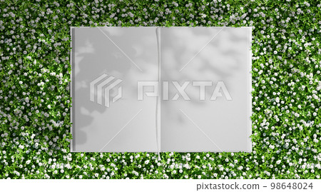 A flowery garden with cool shade and a background of a white book with a bookmark 98648024