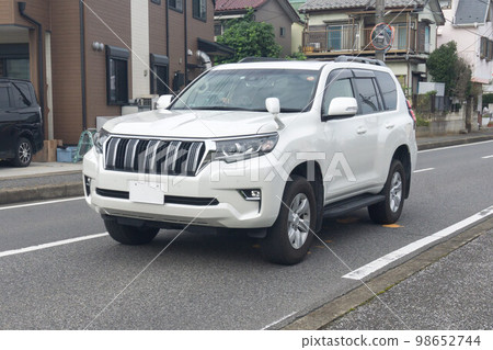 SUV utility vehicle road driving SUV utility vehicle road driving 98652744