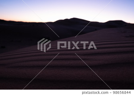 Dawn in the Sahara desert. Empty dunes landscape Dawn in the Sahara desert. Empty dunes landscape 98656844