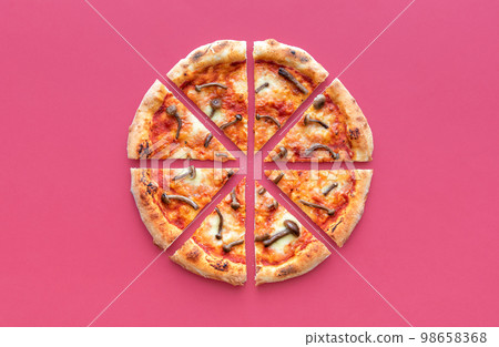 Sliced pizza top view on a magenta background. Wild mushrooms pizza 98658368
