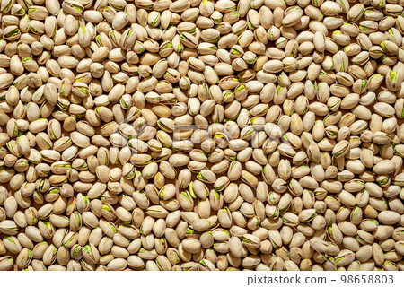Pistachio full frame background, above view. Pistachio full frame background, above view. 98658803