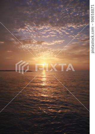 Rocky beach at sunrise, colors Rocky beach at sunrise, colors 98658871