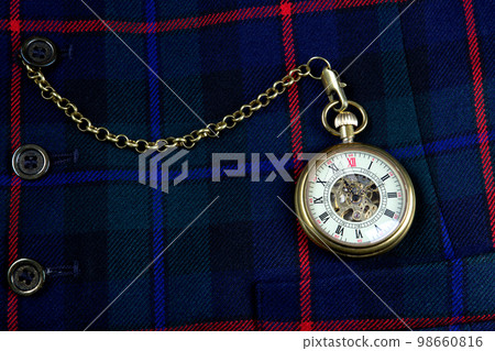 Pocket Watch and Chain on a Scottish Tartan Waistcoat Closeup 98660816