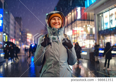 snowfall woman city christmas outside 98661351