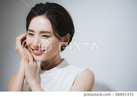 A woman with short hair A woman with short hair 98661455