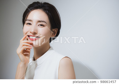 A woman with short hair A woman with short hair 98661457