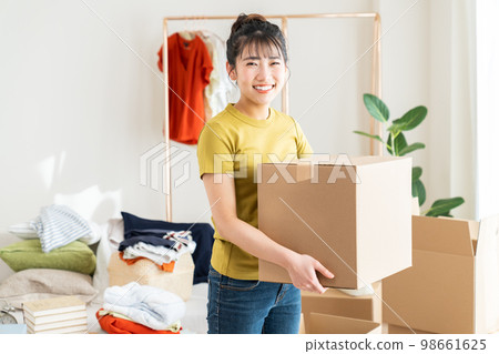 Young woman moving 98661625