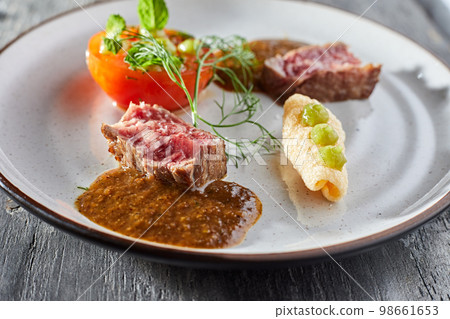 Beautiful and tasty food on a plate Beautiful and tasty food on a plate 98661653