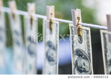 Money Laundering. Money Laundering US dollars hung out to dry. Money Laundering. Money Laundering US dollars hung out to dry. 98666318