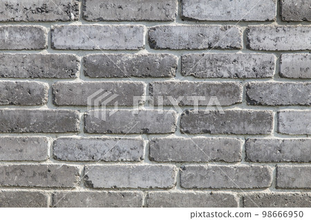 dark wall made of ash color bricks dark wall made of ash color bricks 98666950