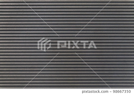 Dark striped wooden wall. Interior element 98667350