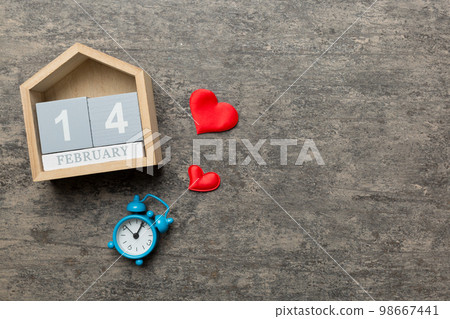 Valentine Day theme with wooden block calendar. Greeting card template for Valentines Day. Top view, copy space for text 98667441