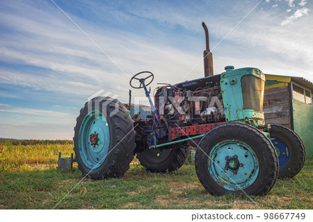 old tractor in field old tractor in field 98667749