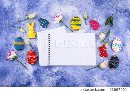 Easter cookies in shape of eggs and bunny 98667961