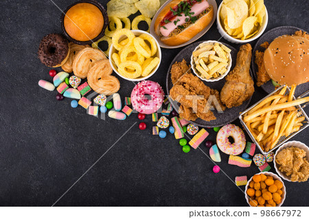 Assortment of various unhealthy junk food. 98667972