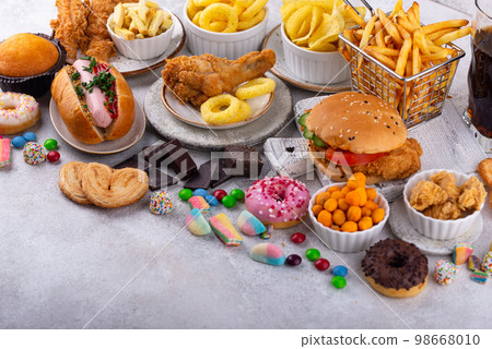 Assortment of various unhealthy junk food. Assortment of various unhealthy junk food. 98668010