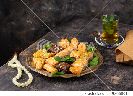 Ramadan iftar traditional desserts baklava and dates 98668014