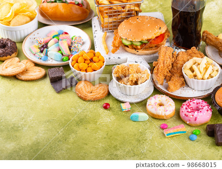 Assortment of various unhealthy junk food. 98668015