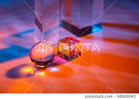 Glass crystal prism. Multicolor light effect Glass crystal prism. Multicolor light effect 98668043