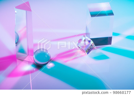 Glass crystal prism. Multicolor light effect 98668177