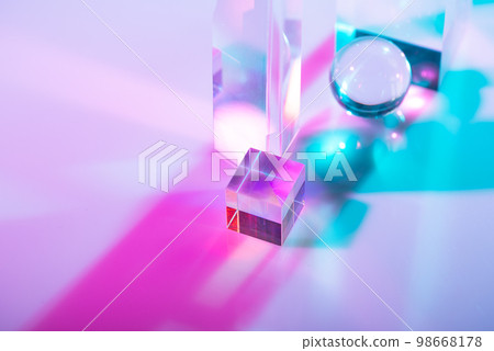 Glass crystal prism. Multicolor light effect 98668178