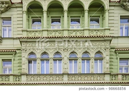 Green facade of czech architecture in Prague. 98668856
