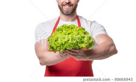 cropped view of man in apron with fresh lettuce vegetable isolated on white 98668943