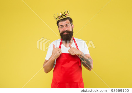 Premium quality. Kingdom of tastes. Chief cook and professional culinary. Cook food. Cook with beard and mustache yellow background. Royal recipe. Man king cook wear cooking apron and golden crown Premium quality. Kingdom of tastes. Chief cook and professional culinary. Cook food. Cook with beard and mustache yellow background. Royal recipe. Man king cook wear cooking apron and golden crown 98669100