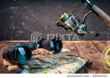 Large binoculars and fishing spinning. Binoculars and rope rope. Finding good places. Large binoculars and fishing spinning. Binoculars and rope rope. Finding good places. 98669303
