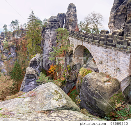 Popular Bastei Bridge in the national park Saxon Switzerland, Germany Popular Bastei Bridge in the national park Saxon Switzerland, Germany 98669320