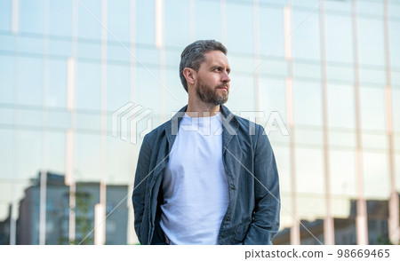 stylish fashion model guy. unshaven guy in stylish fashion. fashion guy outdoor. stylish fashion model guy. unshaven guy in stylish fashion. fashion guy outdoor. 98669465
