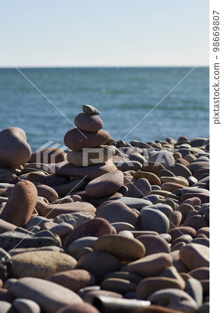 Small mountain of three rocks Small mountain of three rocks 98669807