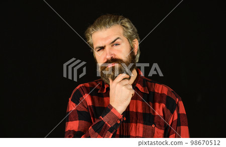 brutal caucasian hipster with moustache. Male barber care. Bearded man. Hair and beard care. Confident and handsome brutal man. Young and brutal. Facial care. Mature hipster with beard brutal caucasian hipster with moustache. Male barber care. Bearded man. Hair and beard care. Confident and handsome brutal man. Young and brutal. Facial care. Mature hipster with beard 98670512