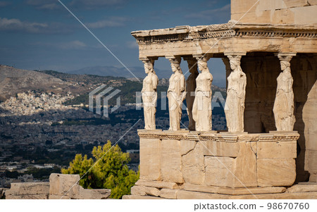 Cityscape of Athens, view from Acropolis on the hill. Vacation, travel, destination concept. Cityscape of Athens, view from Acropolis on the hill. Vacation, travel, destination concept. 98670760