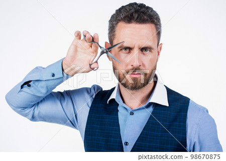 handsome man hold barber scissors, hair care 98670875