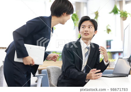 Business person men and women meeting about materials being created 6 98671783