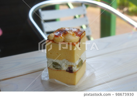 A delicious square shortcake on a white table 98673930
