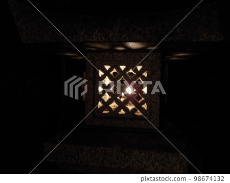 Katsube Shrine Fire Festival: The light of stone lanterns illuminates the shrine grounds. Moriyama City, Shiga Prefecture. 98674132