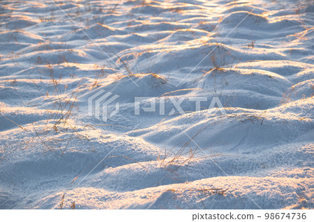 Snow Texture In Cold Temperature at Winter, Top View of the Snow with Sun Rays 98674736