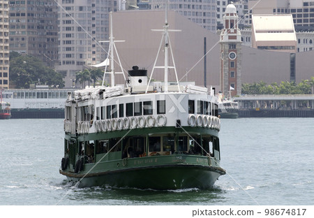Star ferry sailing through Victoria Bay in Hong Kong Star ferry sailing through Victoria Bay in Hong Kong 98674817