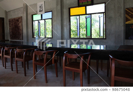 Inside the restaurant during quiet preparations before opening Inside the restaurant during quiet preparations before opening 98675048