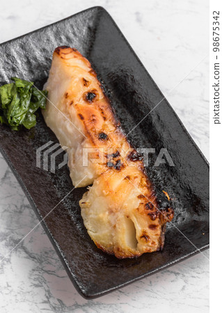 Grilled cod marinated in white miso 98675342