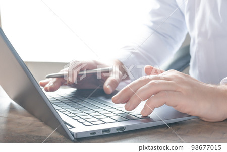 Man hands Typing Keyboard Laptop. Project Manager Researching Process. Digital global business. global network connection, data exchange, digital technology, data science Man hands Typing Keyboard Laptop. Project Manager Researching Process. Digital global business. global network connection, data exchange, digital technology, data science 98677015